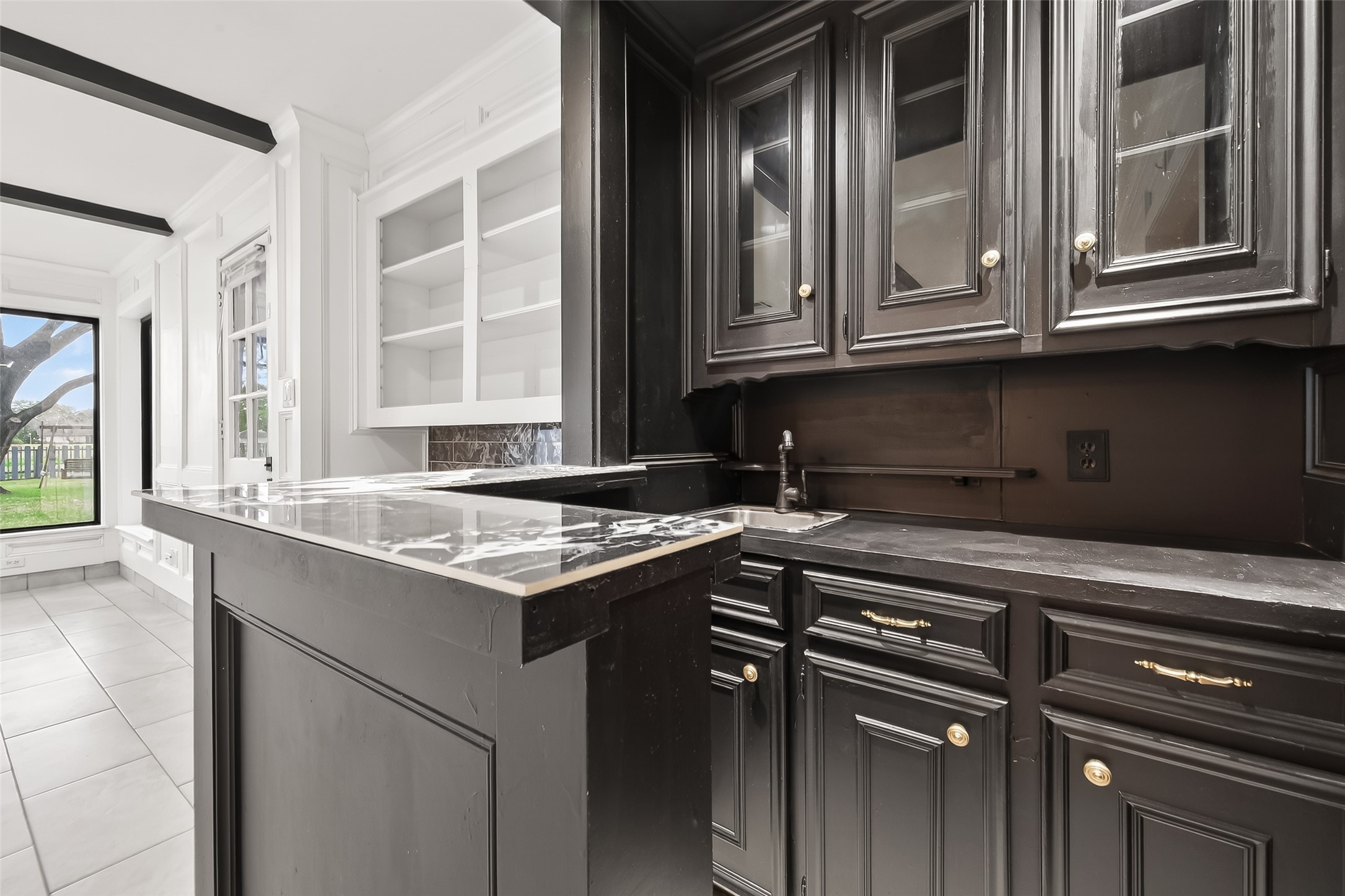 707 Montclair Boulevard Sugar Land, TX 77478 - Photo 8 of 50 a kitchen with a stove and a sink