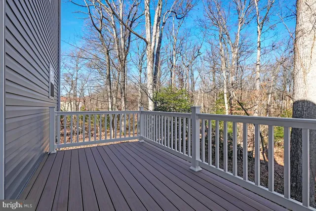 a view of balcony with wooden floor