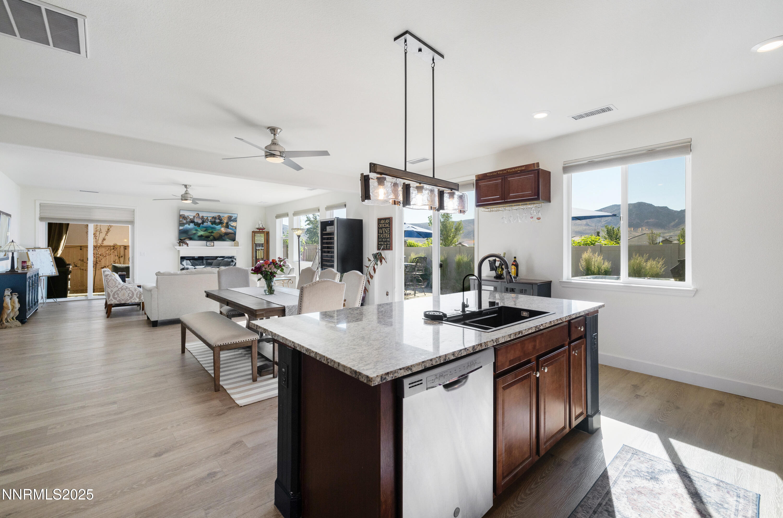 10260 Rollins Drive Reno, NV 89521 - Photo 11 of 44 a view of living room with granite countertop furniture and fireplace