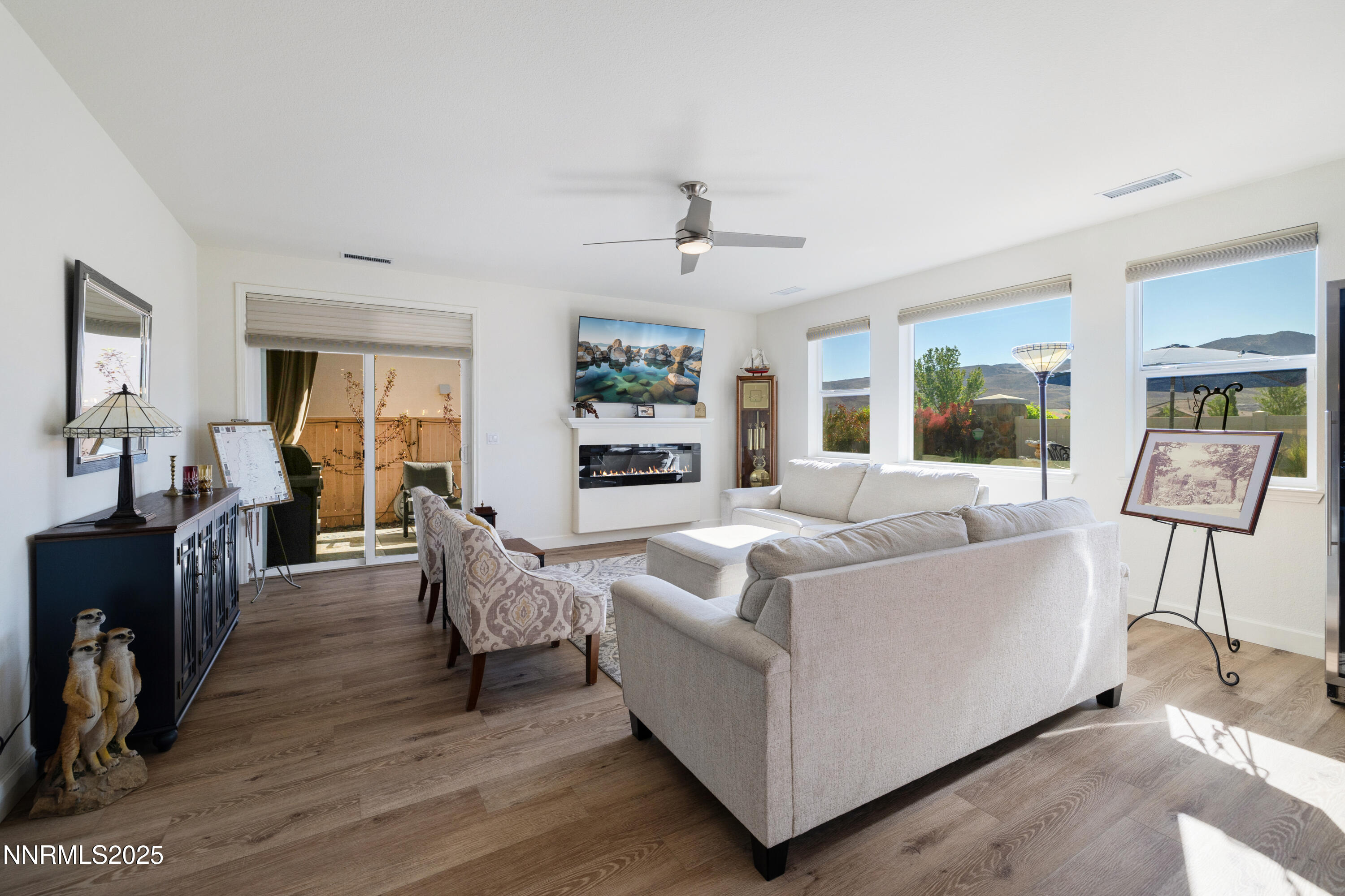 10260 Rollins Drive Reno, NV 89521 - Photo 15 of 44 a living room with furniture and a flat screen tv