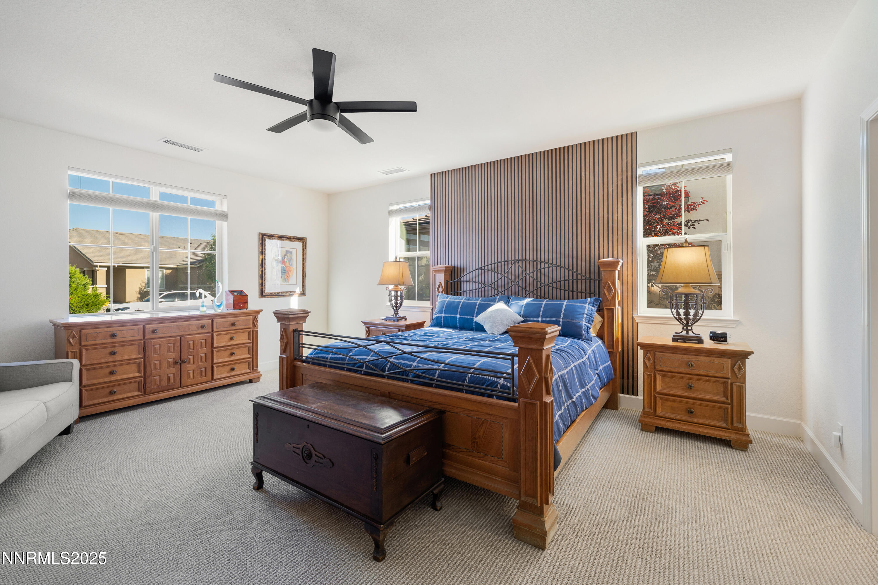 10260 Rollins Drive Reno, NV 89521 - Photo 17 of 44 a living room with furniture and a lamp