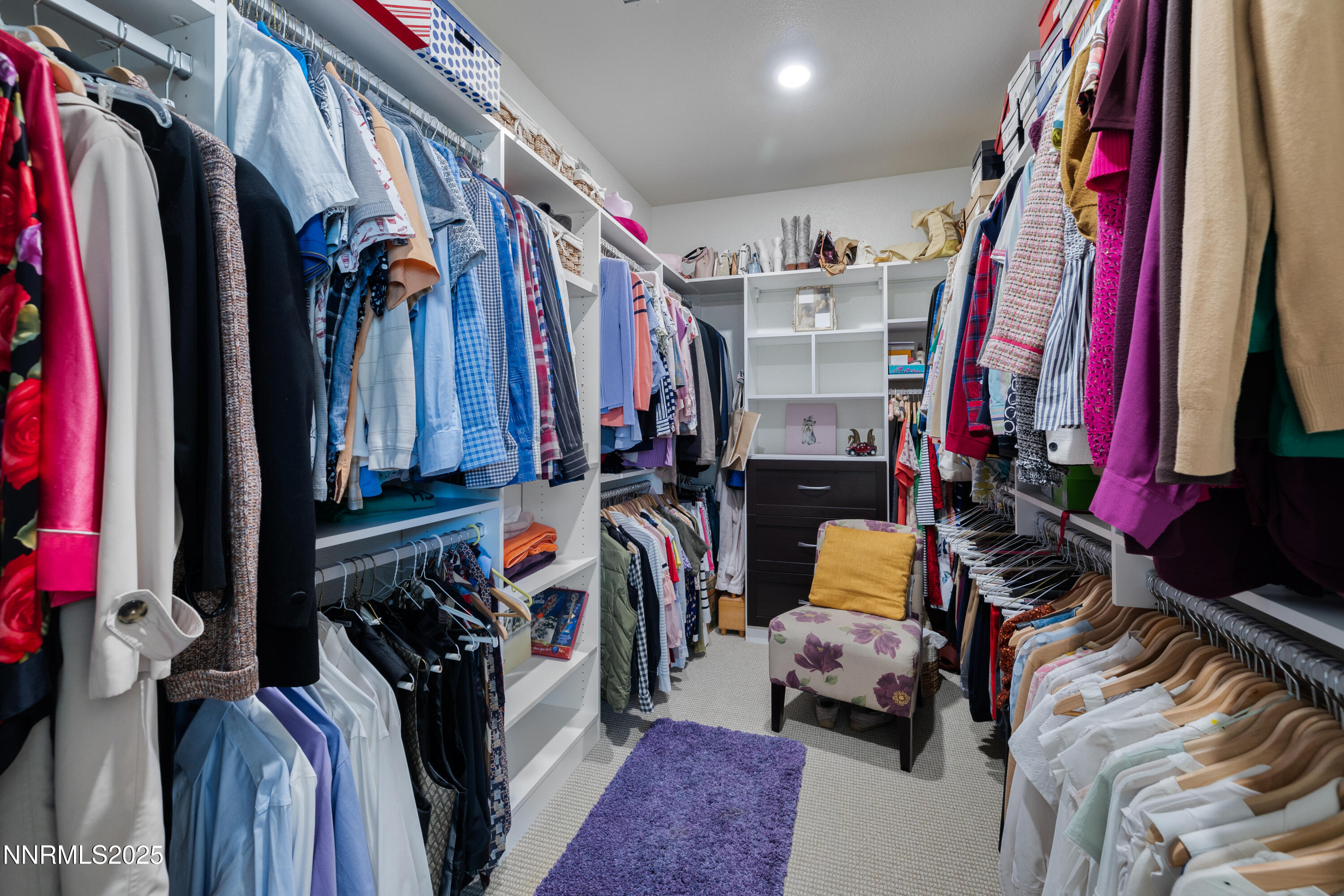 10260 Rollins Drive Reno, NV 89521 - Photo 22 of 44 a view of walk in closet with clothes and shoes