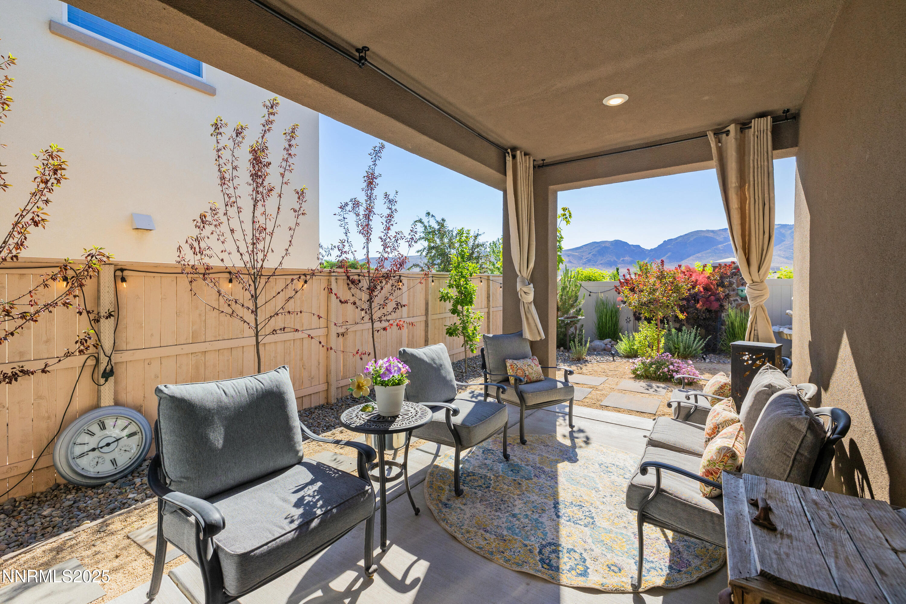 10260 Rollins Drive Reno, NV 89521 - Photo 32 of 44 a living room with furniture and a large window
