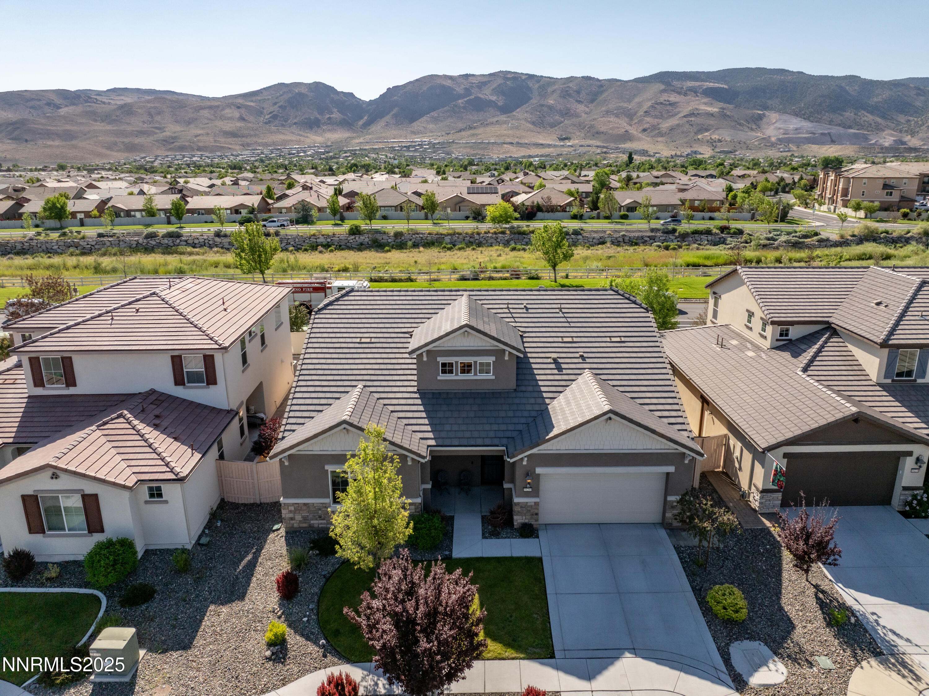 10260 Rollins Drive Reno, NV 89521 - Photo 38 of 44 an aerial view of a house with a garden