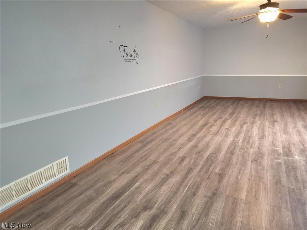 10345 Marne Road Frazeysburg, OH 43822 - Photo 24 of 50 Unfurnished room featuring wood-type flooring and ceiling fan