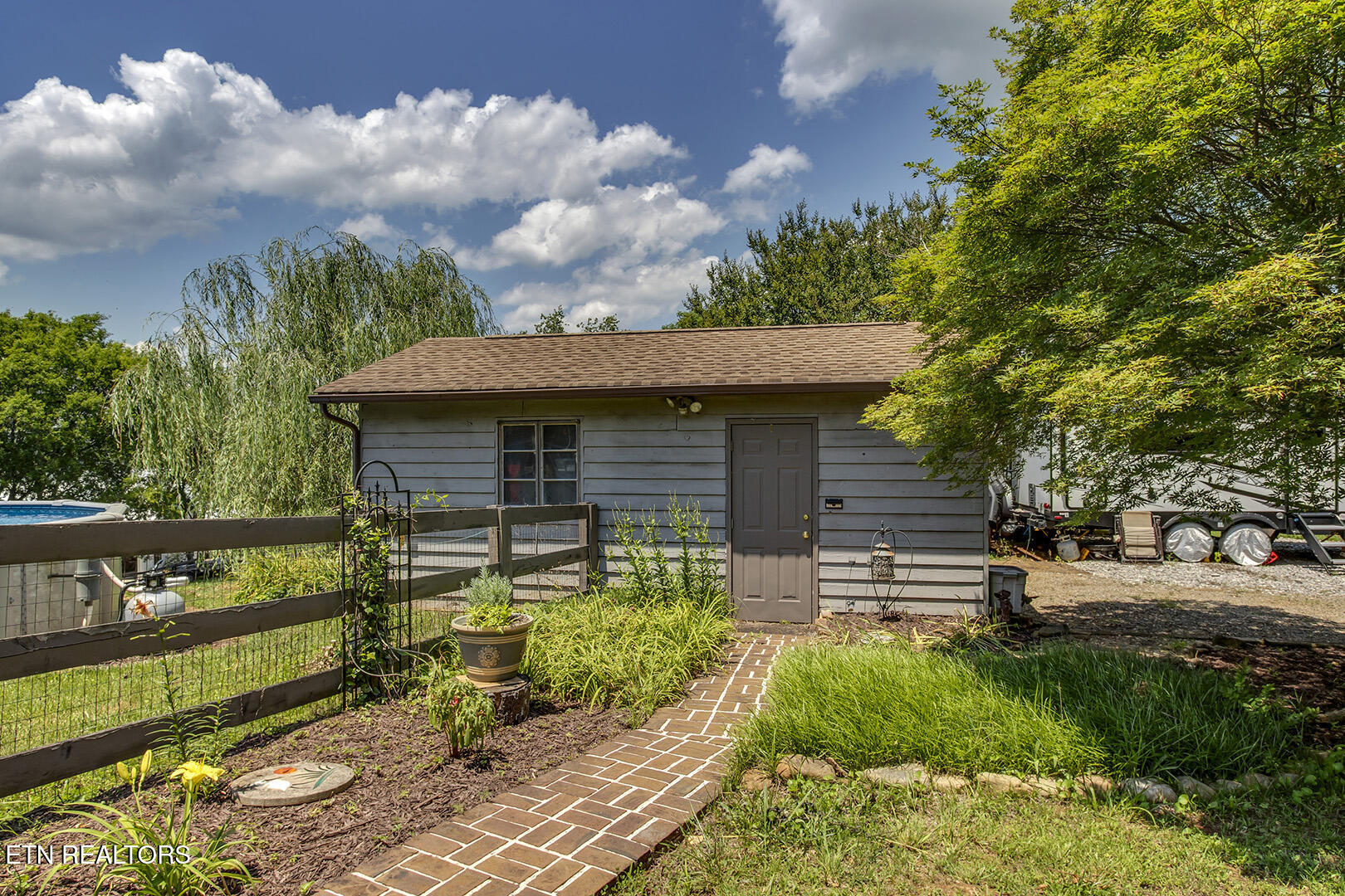 132 Morris Road Kingston, TN 37763 - Photo 46 of 60 46_MorrisLane_132_GarageSideEntry