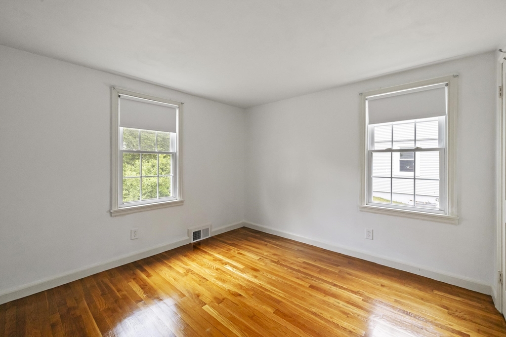 1652 Parker Street Springfield, MA 01128 - Photo 12 of 22 an empty room with a window