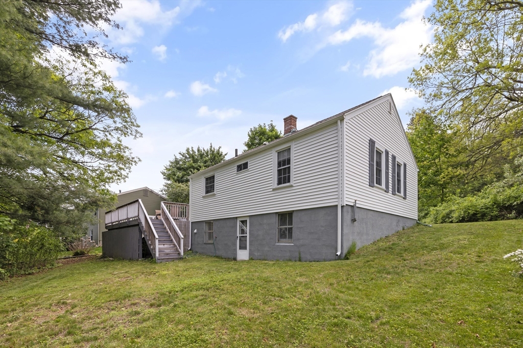 1652 Parker Street Springfield, MA 01128 - Photo 22 of 22 a view of a house with a yard