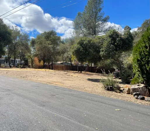 a view of road with trees
