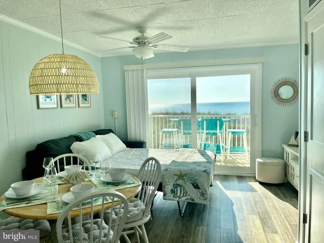 a kitchen with stainless steel appliances granite countertop a sink and a stove