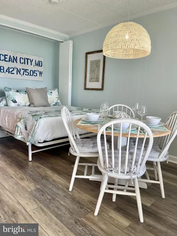 a view of a swimming pool and lounge chair