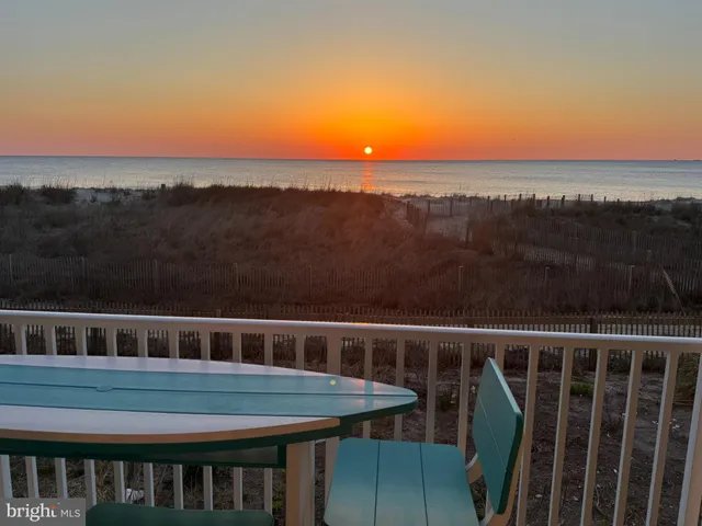 a view of a balcony with mountain view