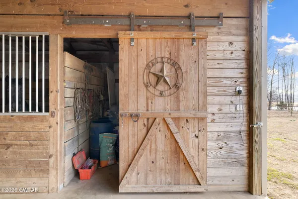 a view of a yard with an outdoor space