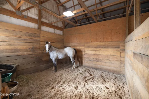 a view of a room with racks on the wall