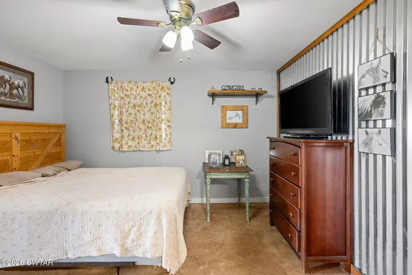 a view of a room with racks on the wall