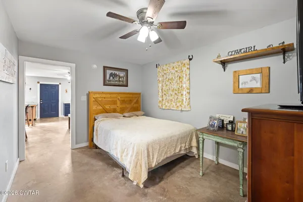 a view of a porch with wooden floor