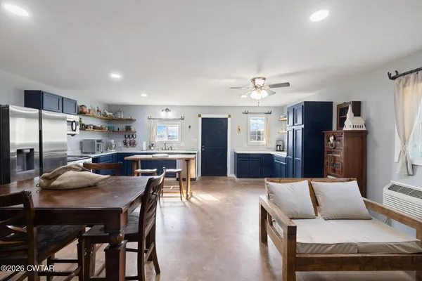 a view of a hall with a wooden floor