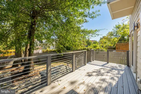 a balcony with view of trees