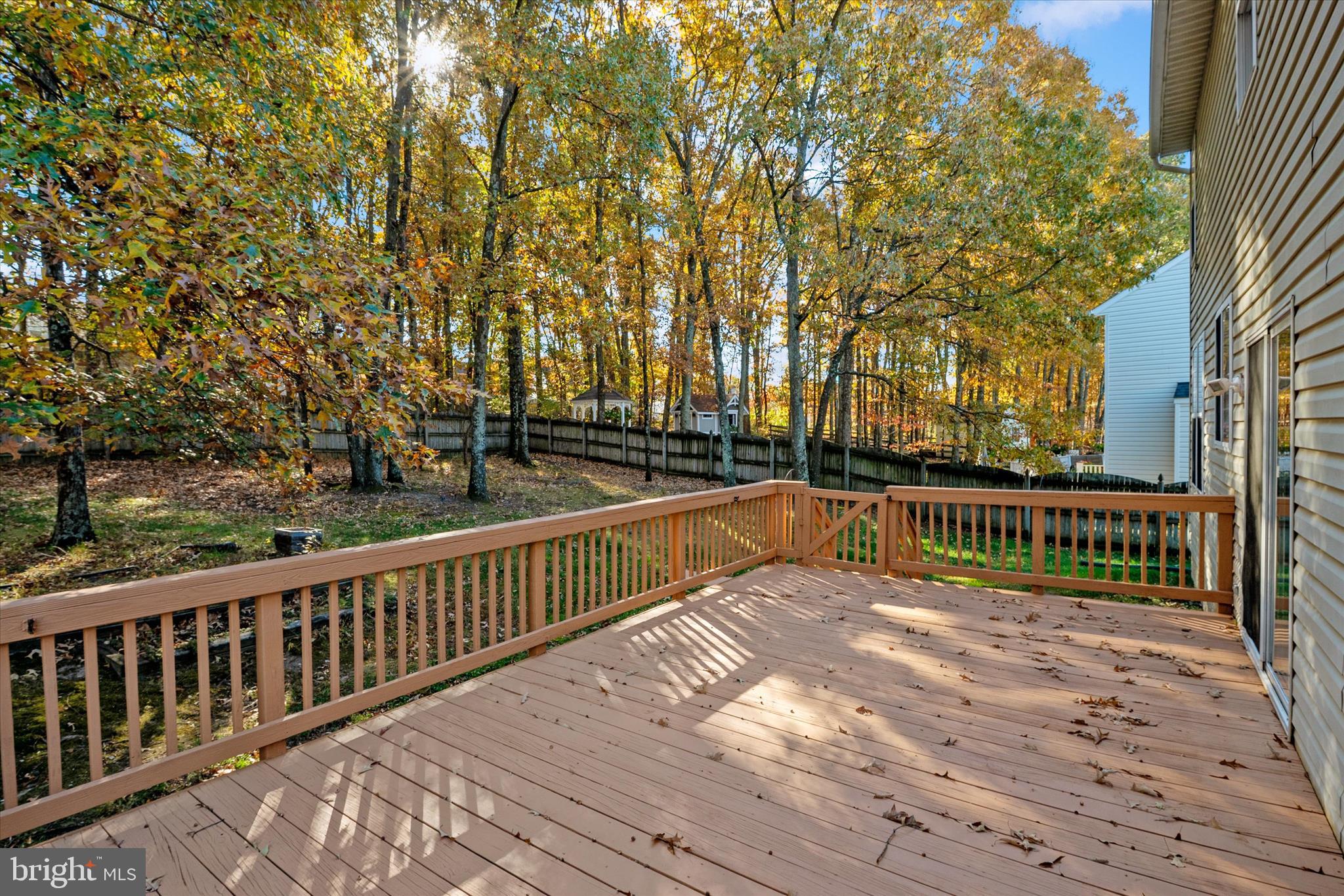 1409 Sweet Cherry Court Severn, MD 21144 - Photo 17 of 56 a view of balcony with wooden floor and fence