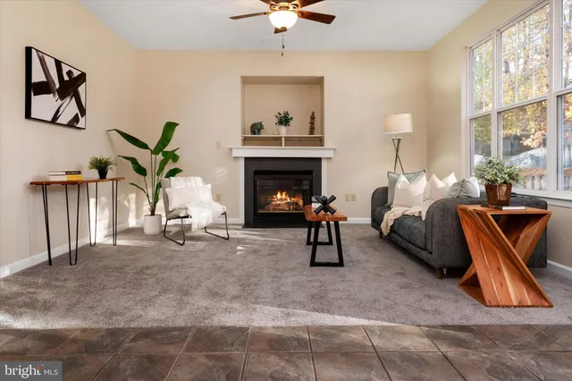 a lobby with furniture and window