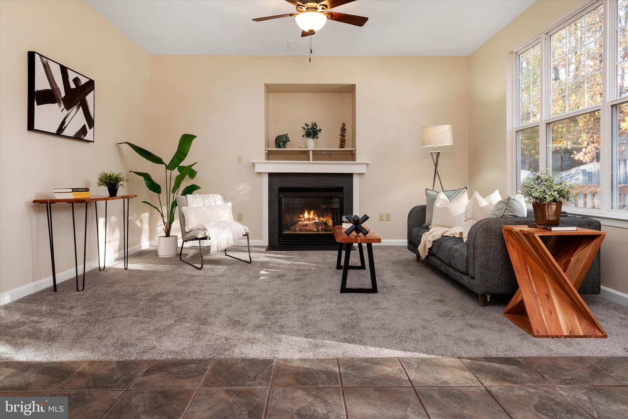 1409 Sweet Cherry Court Severn, MD 21144 - Photo 19 of 56 a living room with furniture and a fireplace