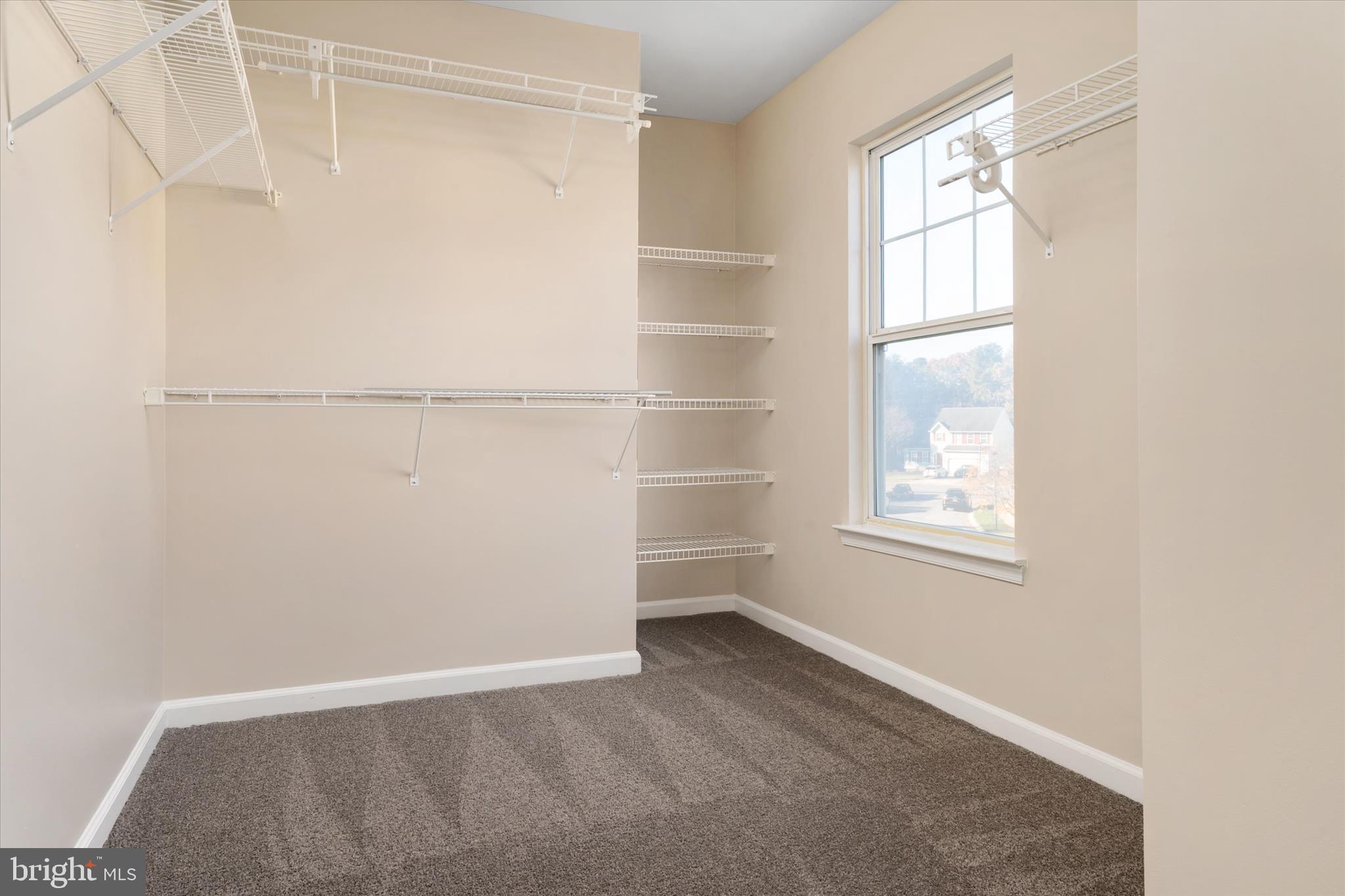 1409 Sweet Cherry Court Severn, MD 21144 - Photo 26 of 56 a view of an empty room with a window