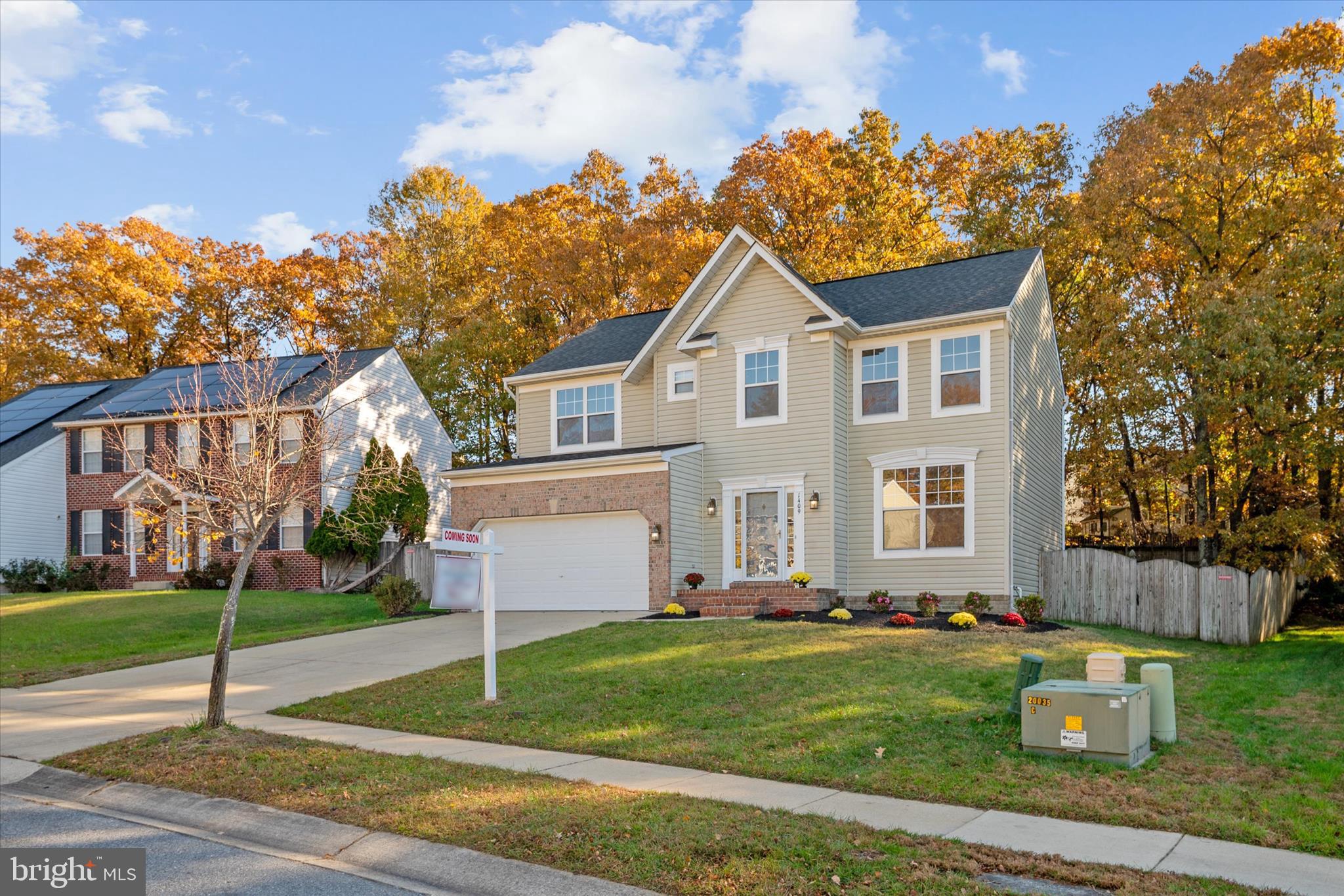 1409 Sweet Cherry Court Severn, MD 21144 - Photo 3 of 56 a front view of a house with a yard