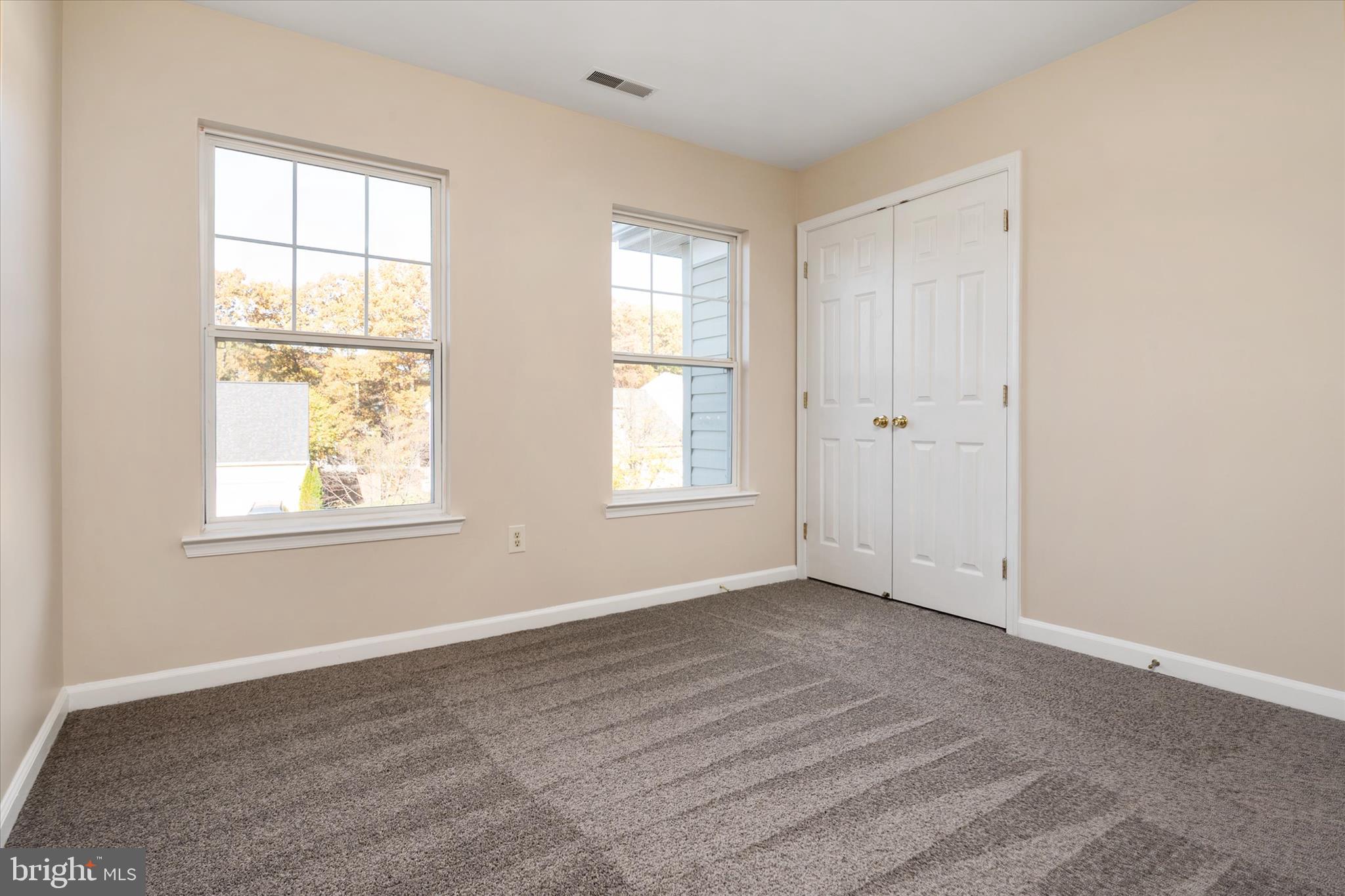 1409 Sweet Cherry Court Severn, MD 21144 - Photo 35 of 56 an empty room with windows
