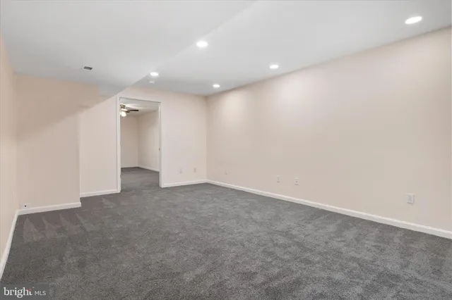 a bathroom with a toilet and shower