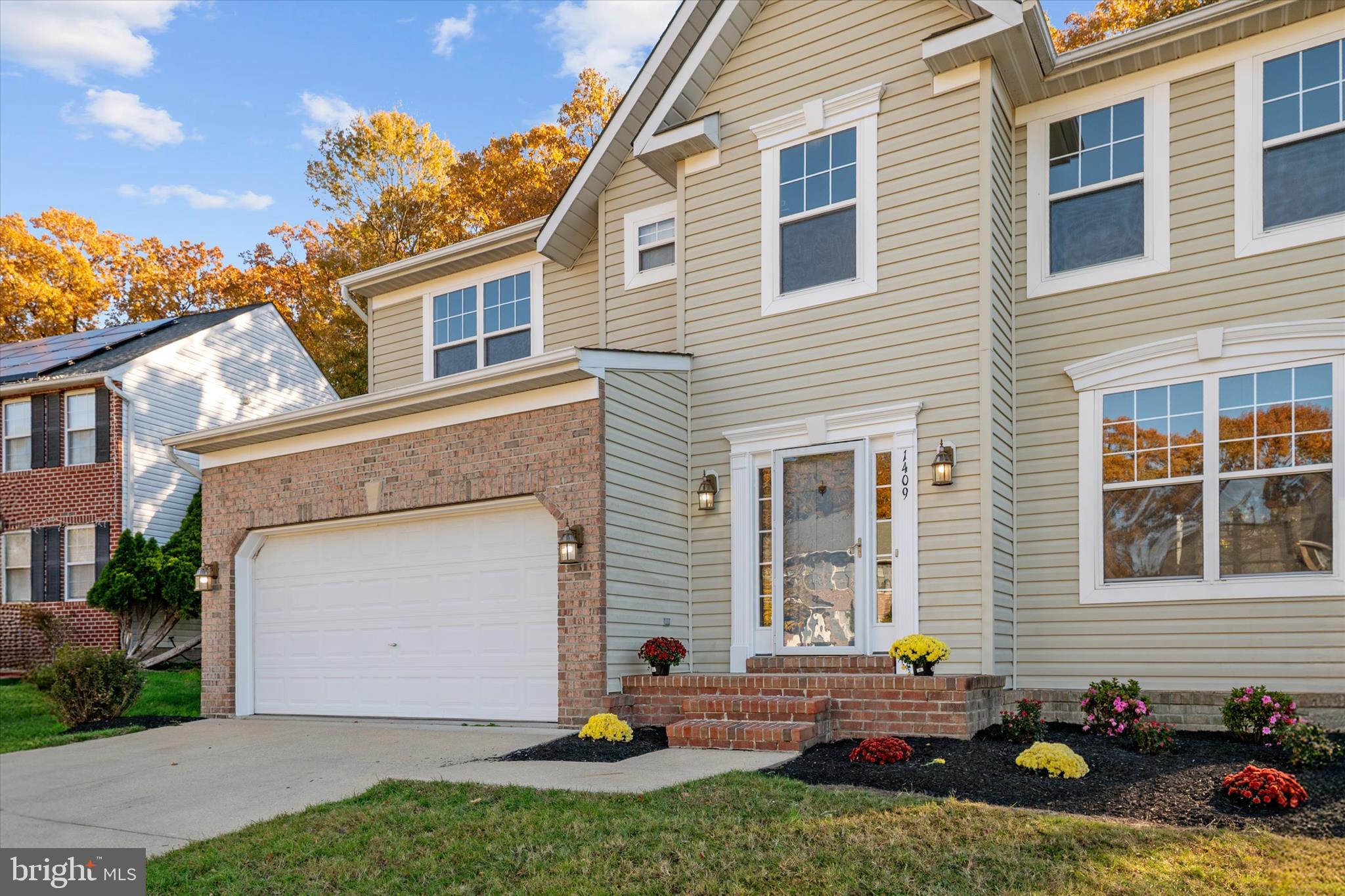 1409 Sweet Cherry Court Severn, MD 21144 - Photo 4 of 56 a front view of a house with a yard