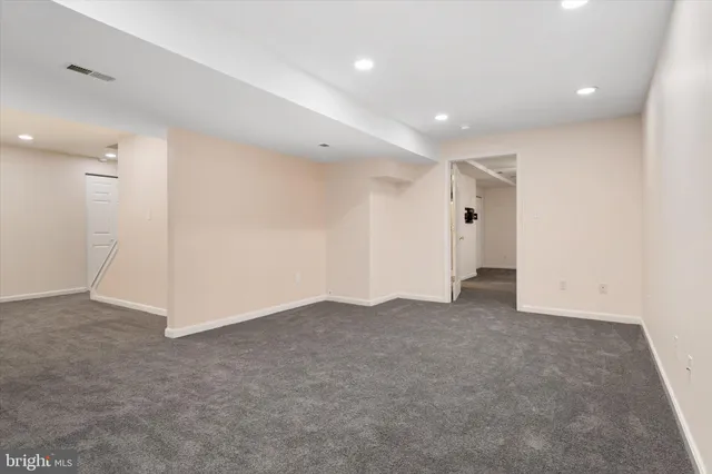 a view of backyard with green space