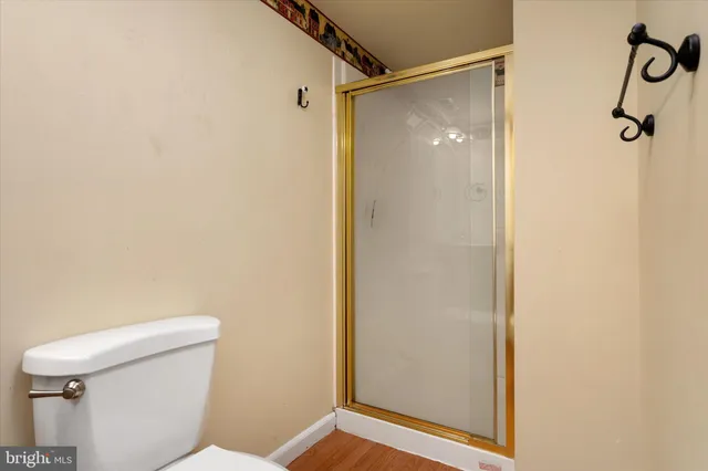 a backyard of a house with lots of green space and fountain