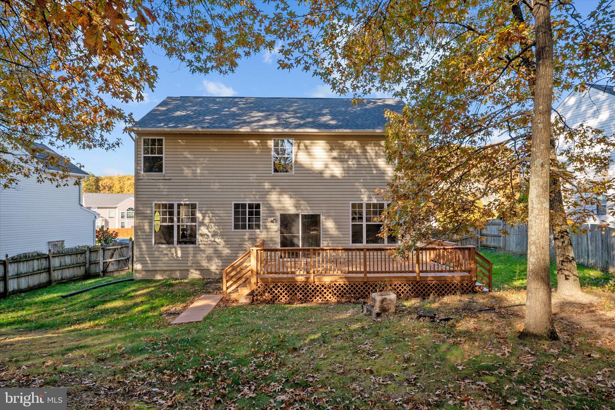1409 Sweet Cherry Court Severn, MD 21144 - Photo 48 of 56 a view of a house with a yard