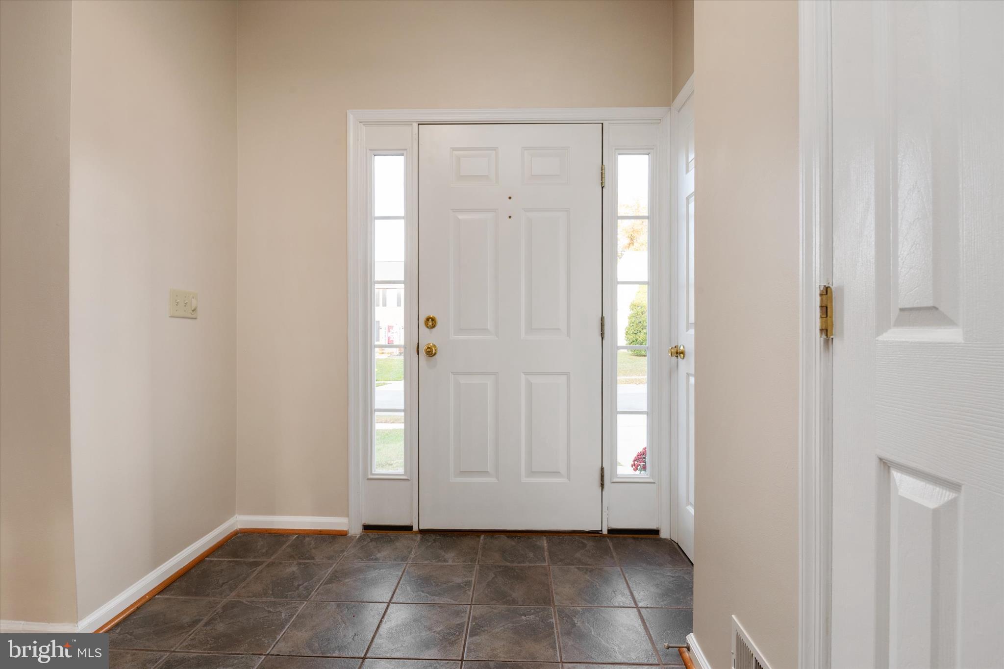 1409 Sweet Cherry Court Severn, MD 21144 - Photo 5 of 56 a view of an empty room with window