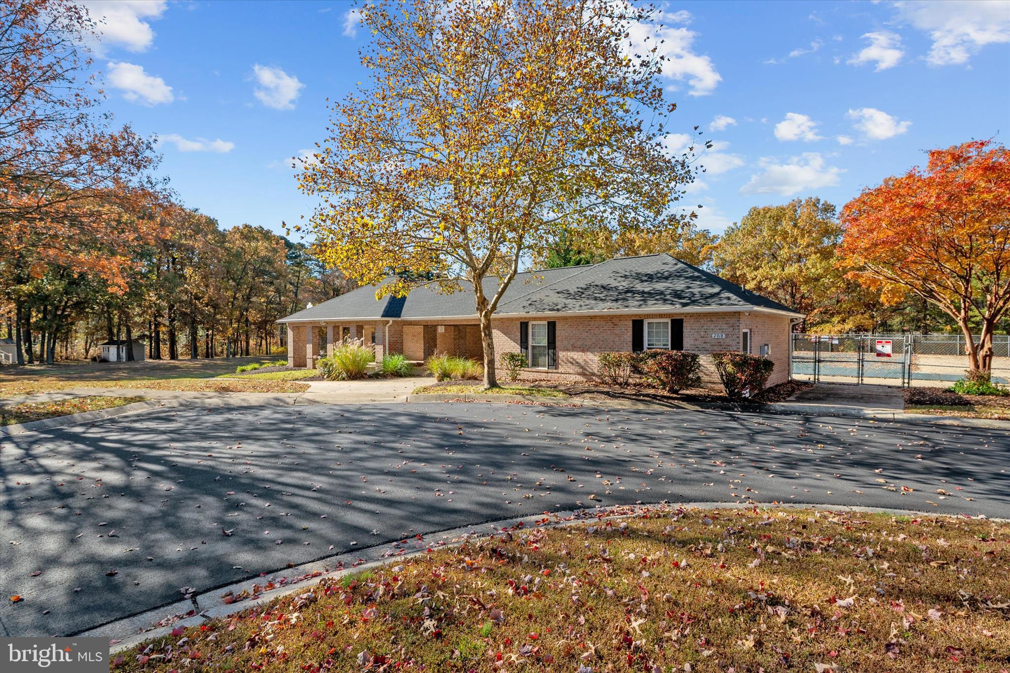 1409 Sweet Cherry Court Severn, MD 21144 - Photo 52 of 56 a front view of a house with a yard