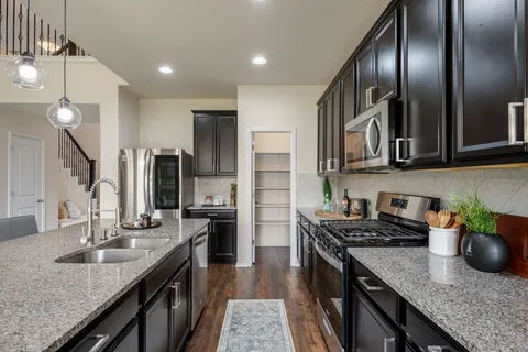 a group of people sitting in a living room