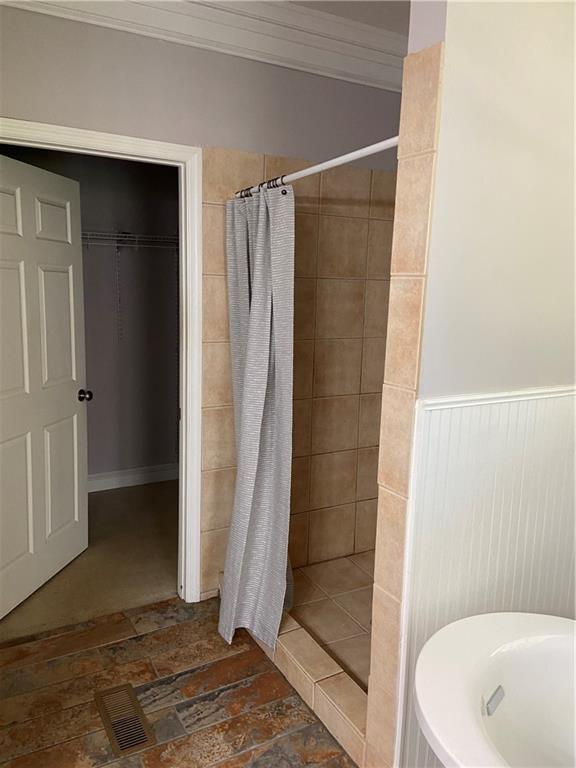 6175 Jett Road Dawsonville, GA 30534 - Photo 14 of 60 a bathroom with a bathtub and shower