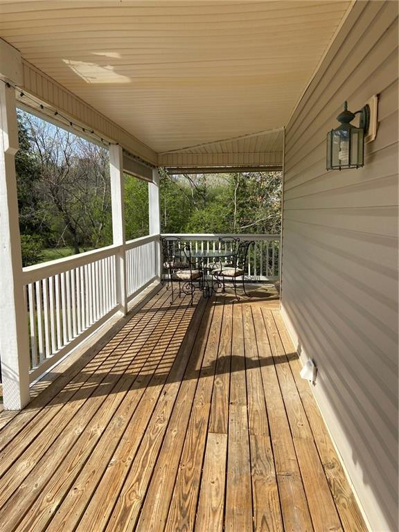 6175 Jett Road Dawsonville, GA 30534 - Photo 47 of 60 a view of balcony with wooden floor