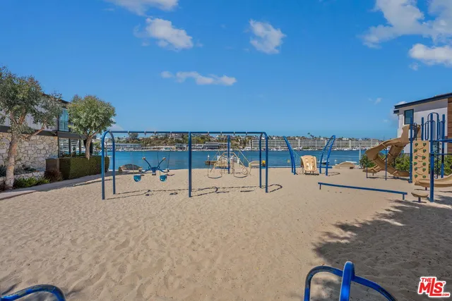 a view of a swimming pool with a lounge chair
