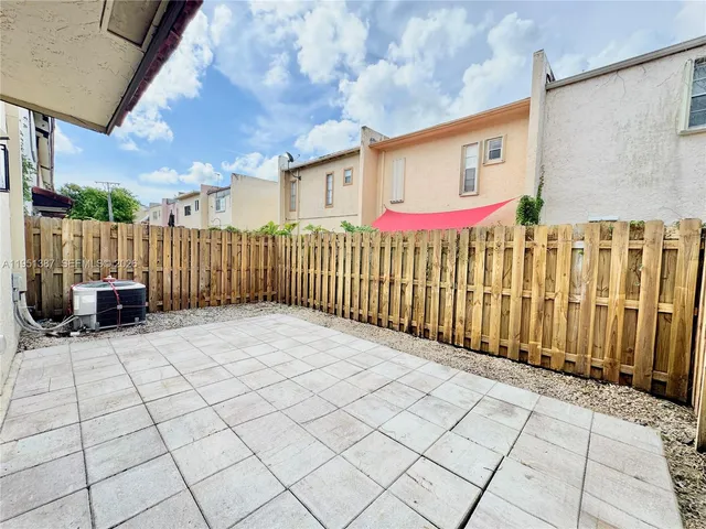 a view of a street with cars