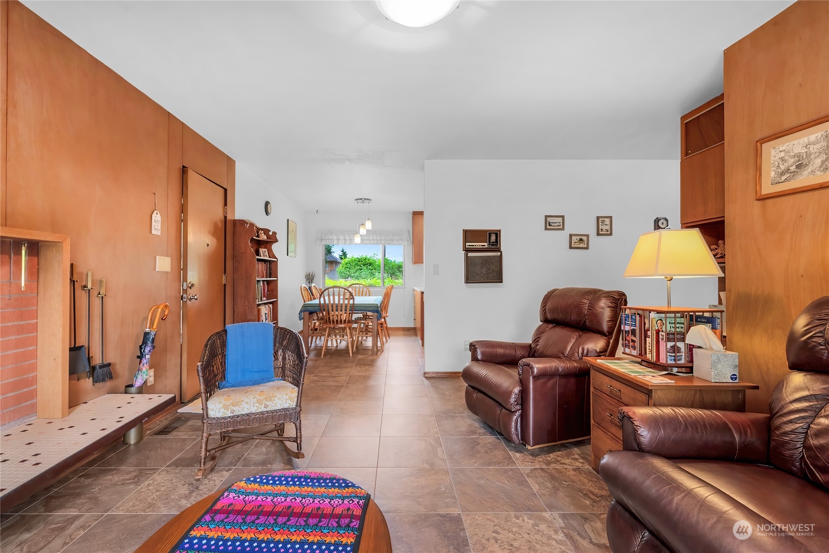 4630 View Drive Everett, WA 98203 - Photo 16 of 40 a living room with furniture a rug and a lamp