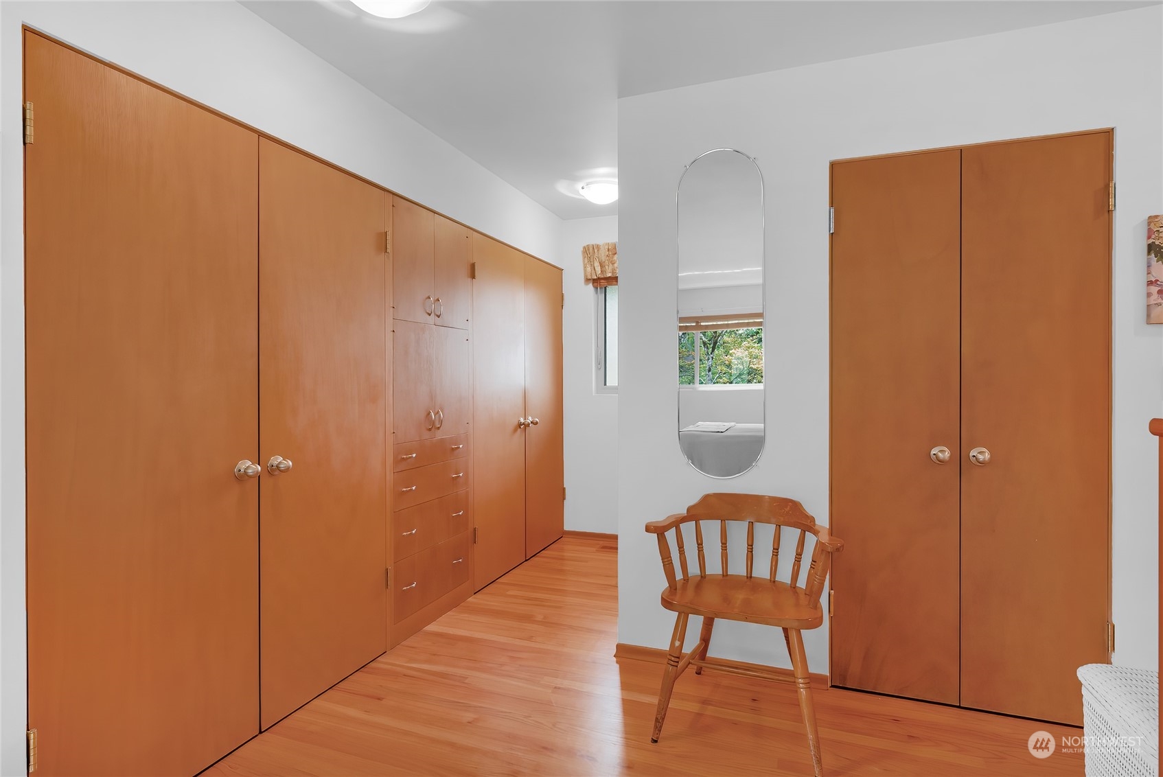 4630 View Drive Everett, WA 98203 - Photo 24 of 40 a view of a hallway with chairs and closet area