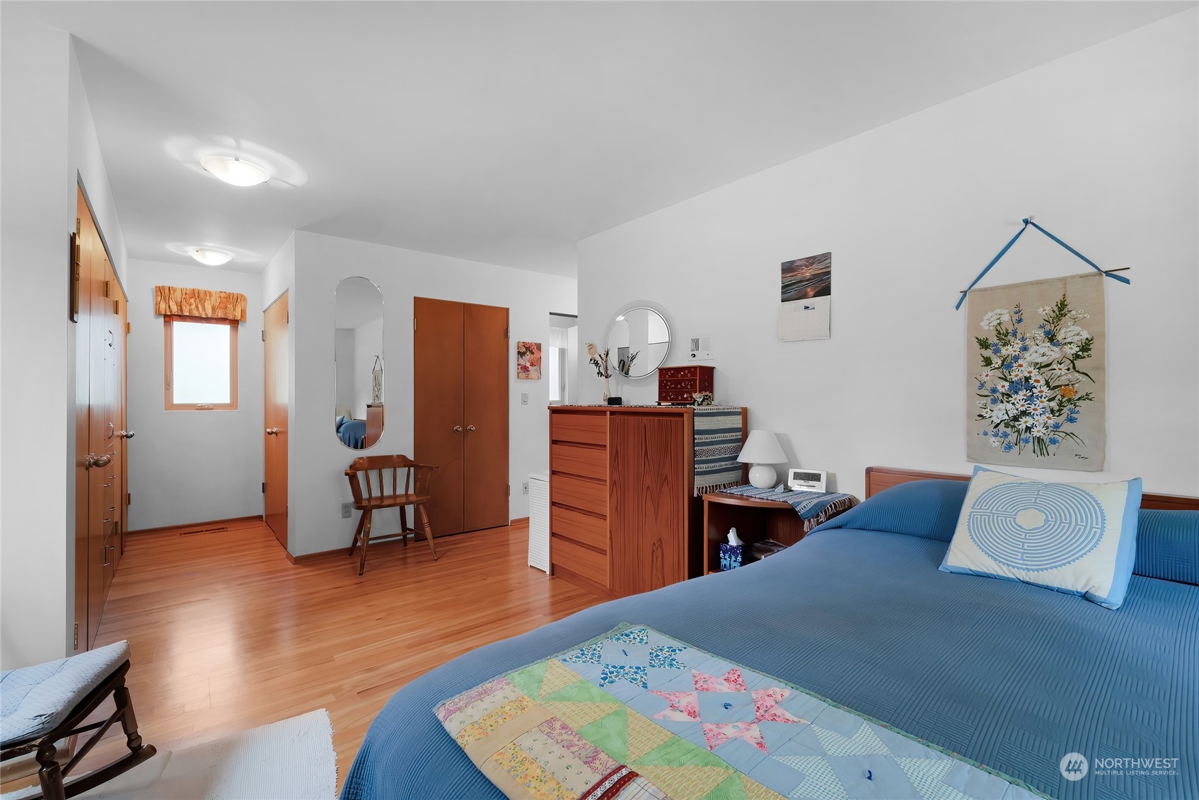 4630 View Drive Everett, WA 98203 - Photo 25 of 40 a bedroom with furniture and a wooden floor