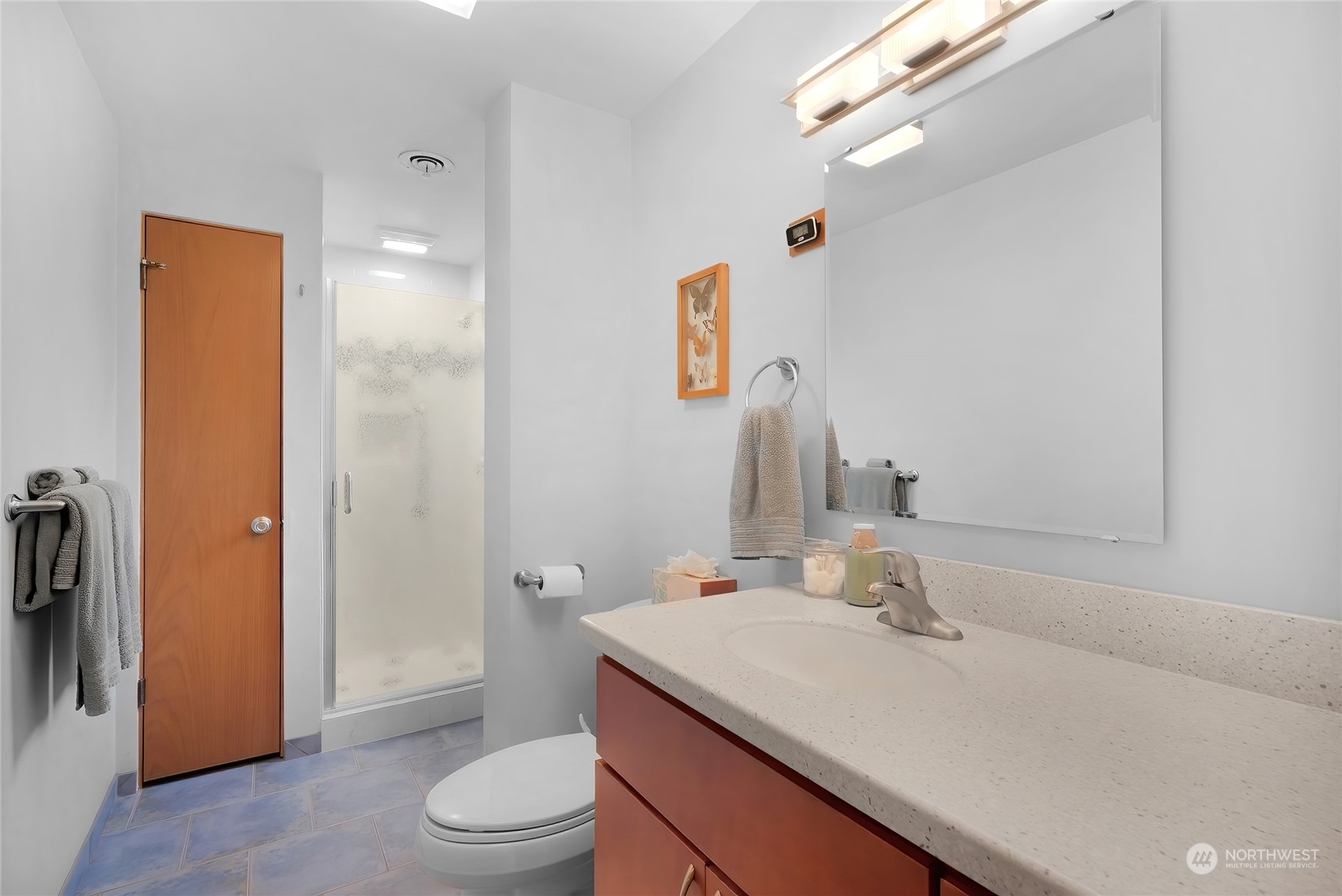 4630 View Drive Everett, WA 98203 - Photo 26 of 40 a bathroom with a granite countertop sink toilet and shower