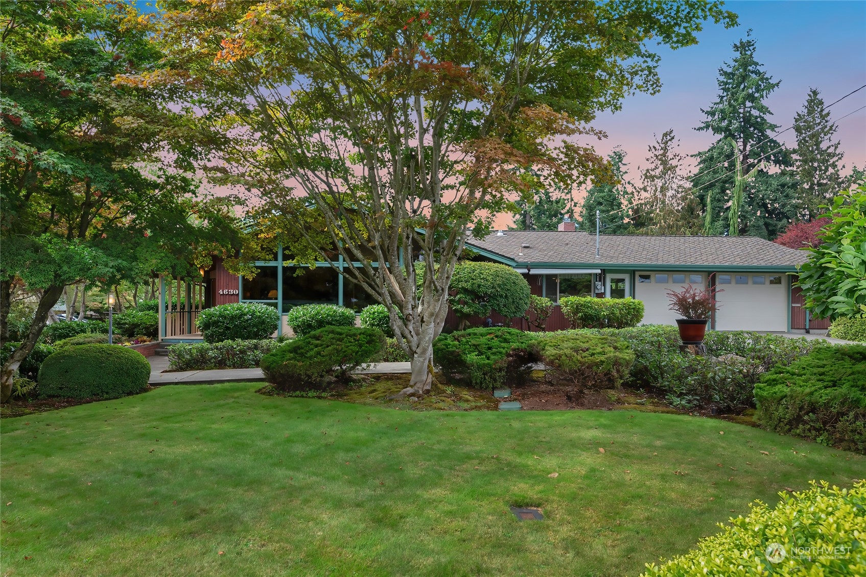 4630 View Drive Everett, WA 98203 - Photo 3 of 40 a front view of a house with a yard and green space