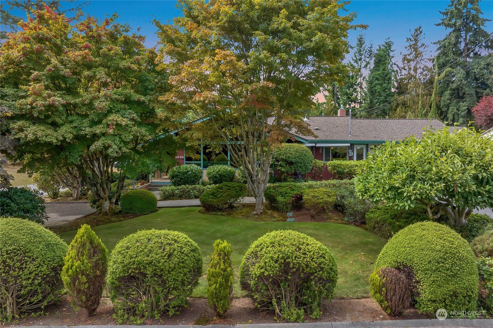 4630 View Drive Everett, WA 98203 - Photo 33 of 40 a view of a table and chairs under an umbrella