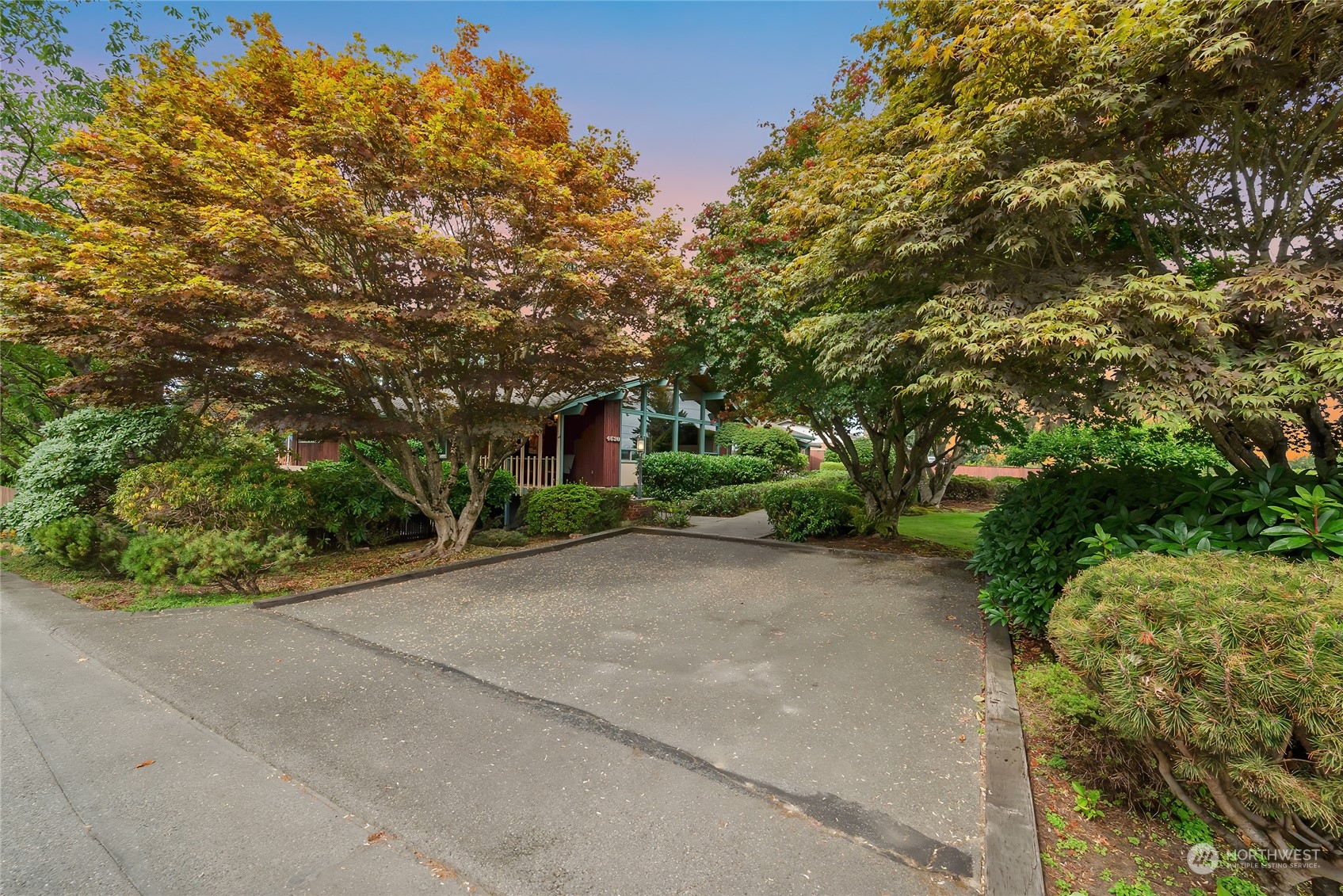 4630 View Drive Everett, WA 98203 - Photo 34 of 40 a front view of a house with a yard and trees