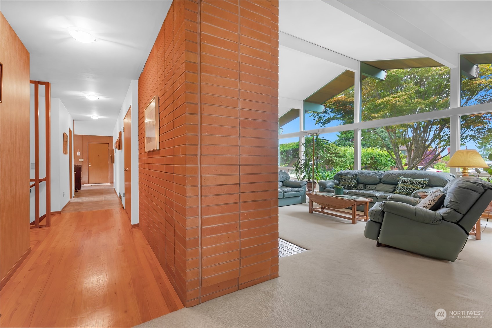 4630 View Drive Everett, WA 98203 - Photo 6 of 40 a living room with furniture and a floor to ceiling window