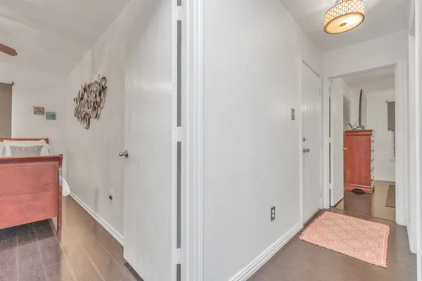 a view of a hallway with closet