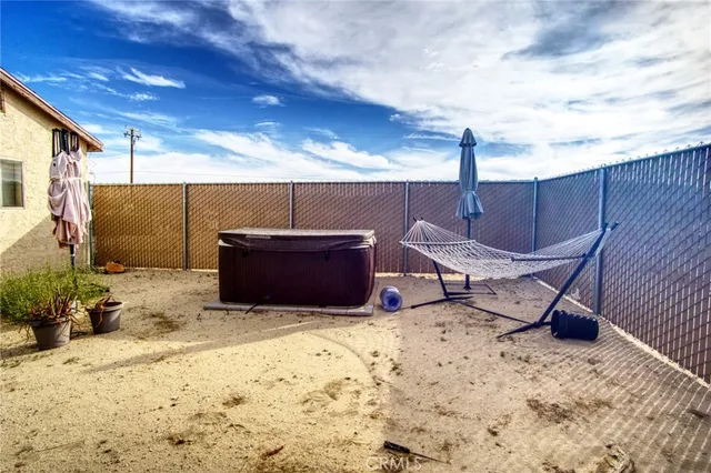 a large white kitchen with a large window